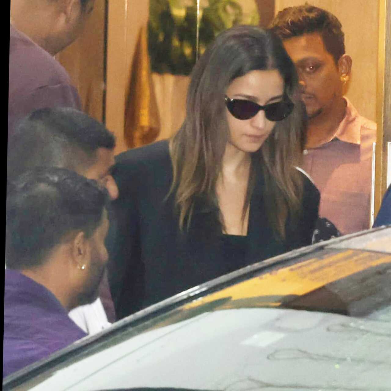 Ranbir was seen in a blue sweater with a cap on his head, while Alia kept it cool in an oversized black coat and black shades.